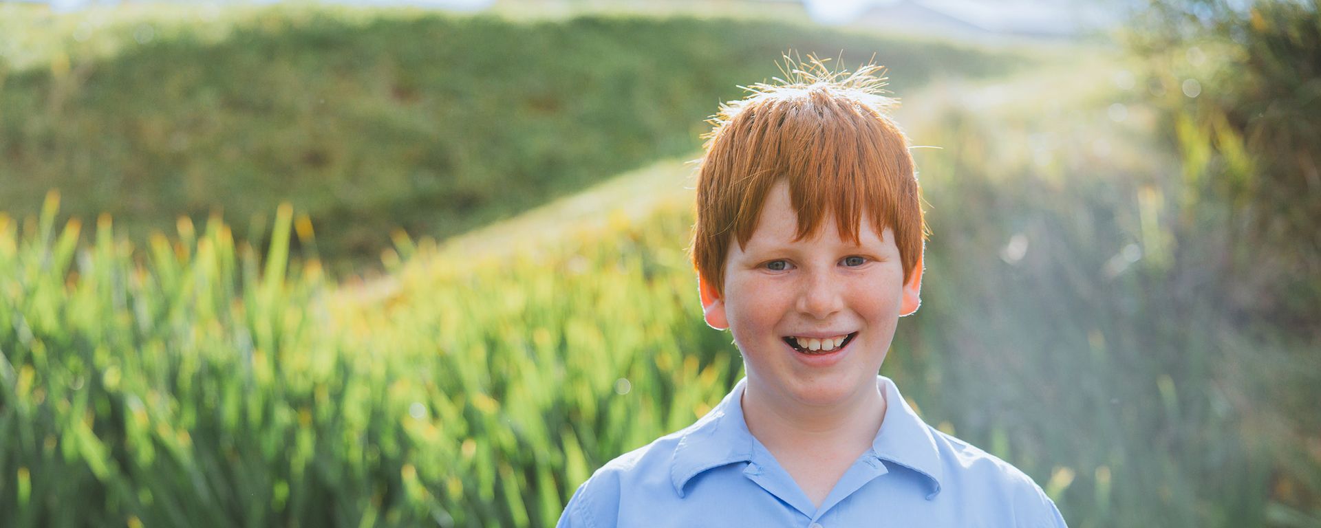 Lake Macquarie primary school boy smiling in Brightwaters Christian College uniform